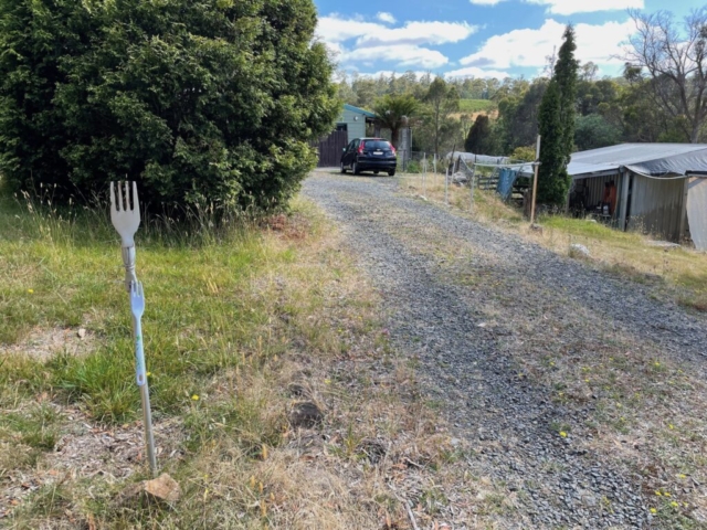 The 'fork' in the road that marks the start of our access drive