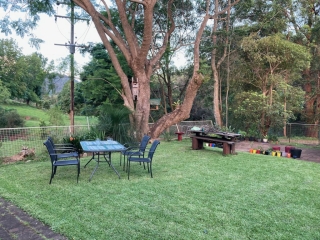 The table is set for lunch in the garden