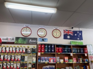 Three clocks showing that Border Village is in a special time zone which is between WA time and SA time