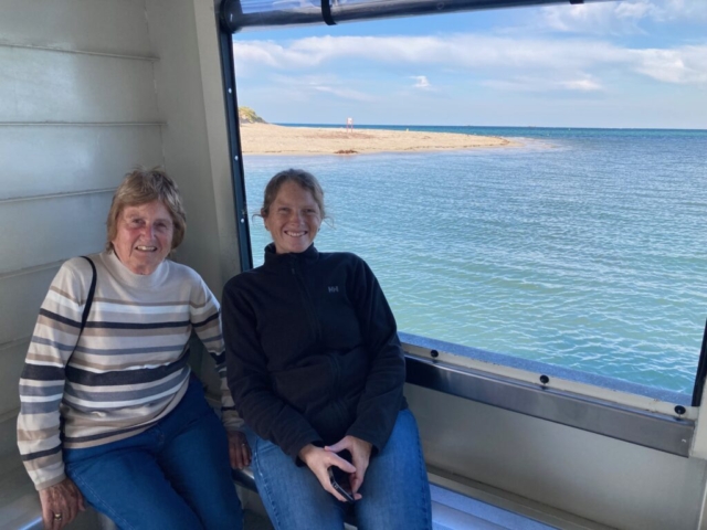 CC and her mum on the ferry to Penguin Island