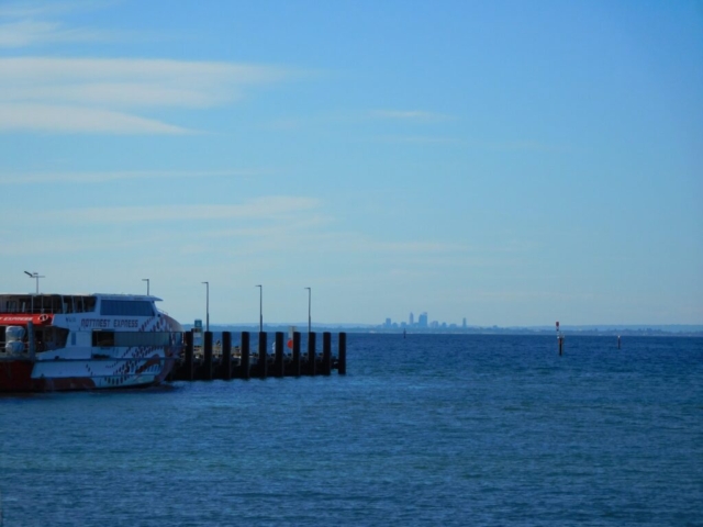 The Rottnest Express at the pier with Perth on the horizon