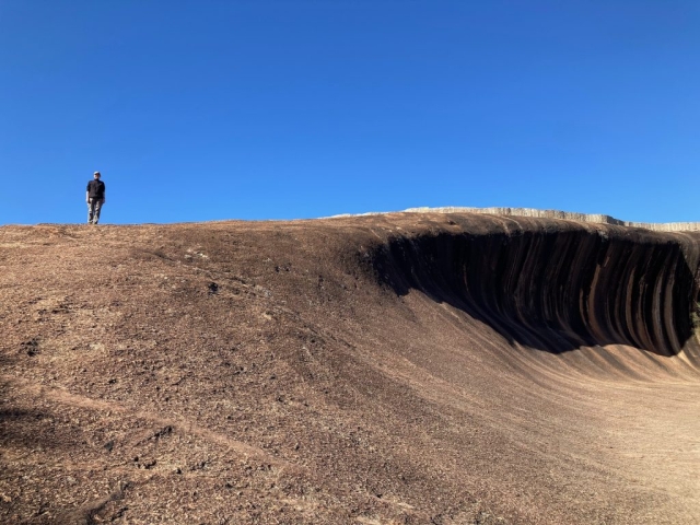 CC is ready to descend Wave Rock