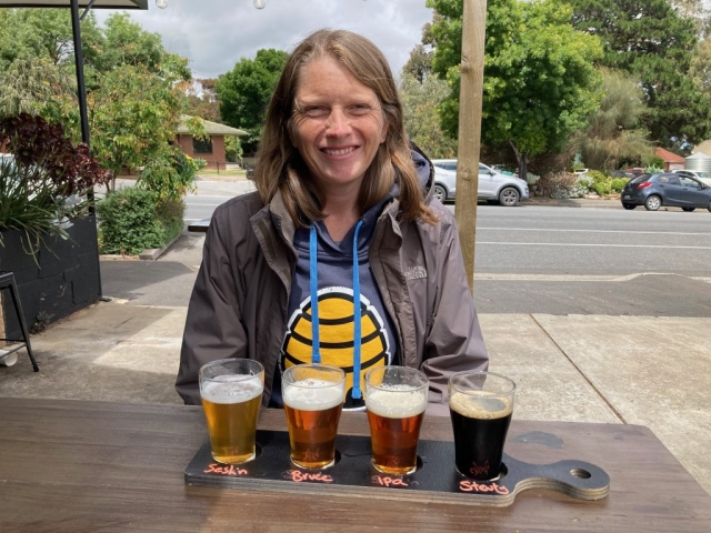 CC with tasting paddle at Shifty Lizard