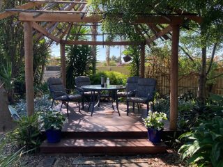 Wooden patio in our front garden
