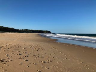A deserted Black Head Beach