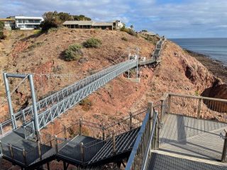 Suspension bridge on the coastal trail Suspension bridge on the coastal trail