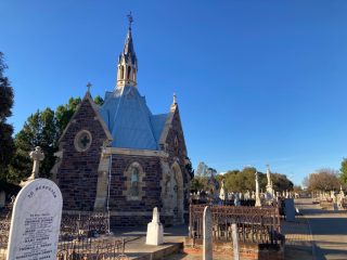 The trail passes through a cemetery