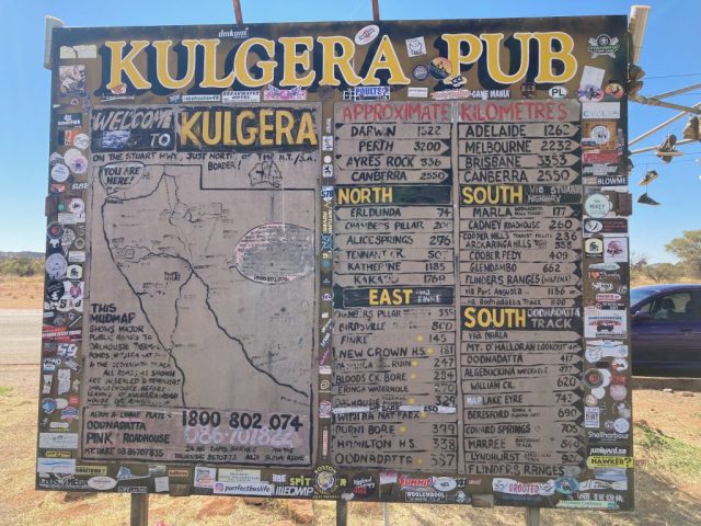 Signpost at Kulgera on the way to Coober Pedy - only 410km to go